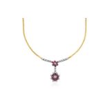A Ruby and Diamond Necklacea round brilliant cut diamond within a border of round cut rubies flanked