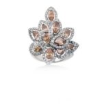 A Diamond Cluster Ringthe spray motif set throughout with fancy orangey-brown marquise and pear