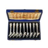 A Cased Set of Nine Edward VII Silver Individual Asparagus-Tongs, by William Hutton and Sons Ltd.,