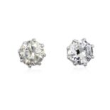 A Pair of Diamond Solitaire Earringsthe round brilliant cut diamonds, in white claw settings,