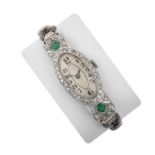 A Lady's Art Deco Emerald and Diamond Oval Shaped Wristwatch, signed Rolex, 1922manual wound lever
