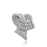 A Diamond Clip the ribbon motif set throughout with round brilliant cut, eight-cut and baguette