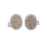 A Pair of Diamond Cufflinksthe oval plaques set throughout with round brilliant cut and eight-cut