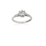 A Diamond Solitaire Ringthe round brilliant cut diamond in a white claw setting, to eight-cut