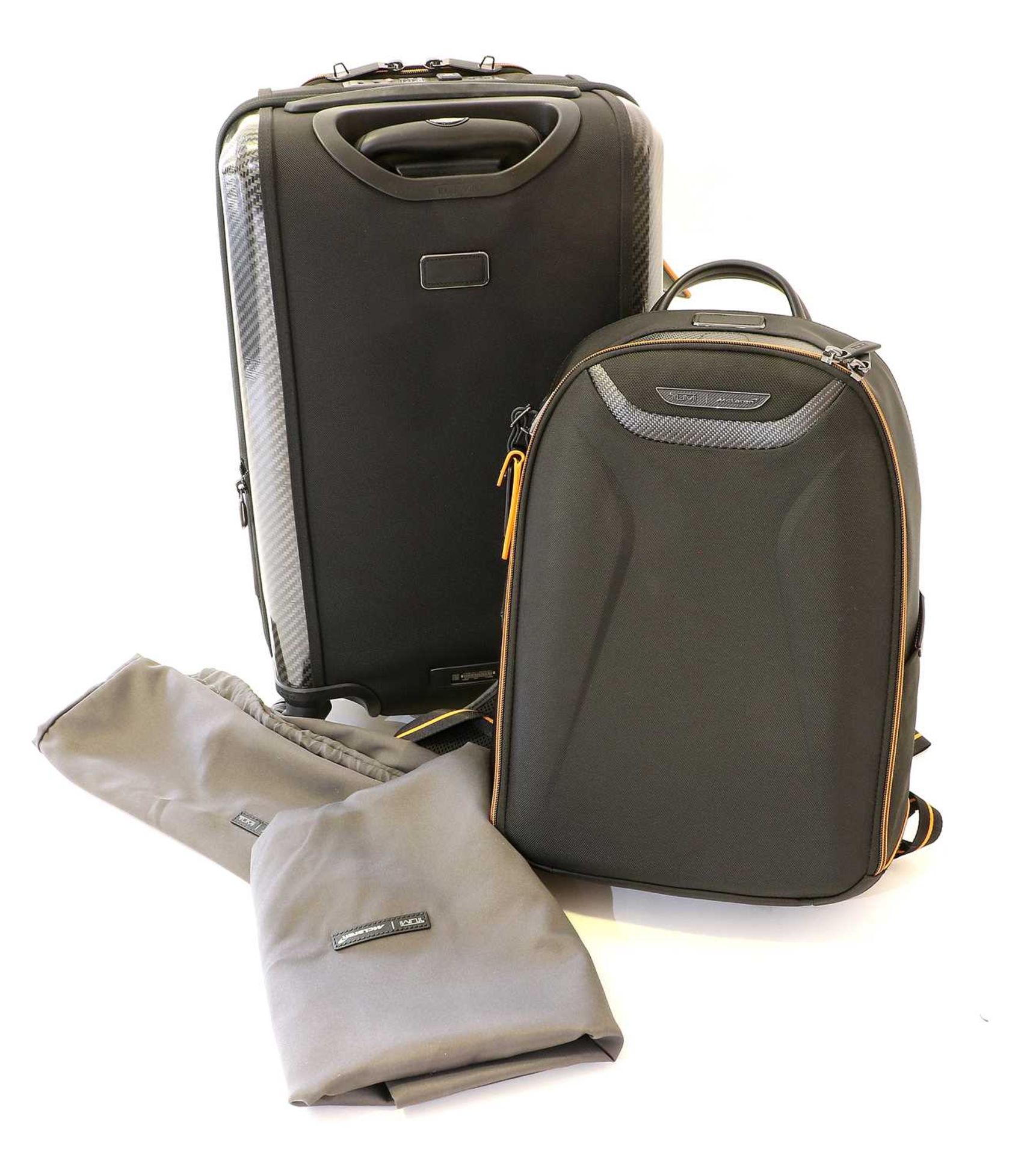 Tumi Luggage: A McLaren Suitcase, with dust cover, 55cm A Matching McLaren Velocity Backpack, with