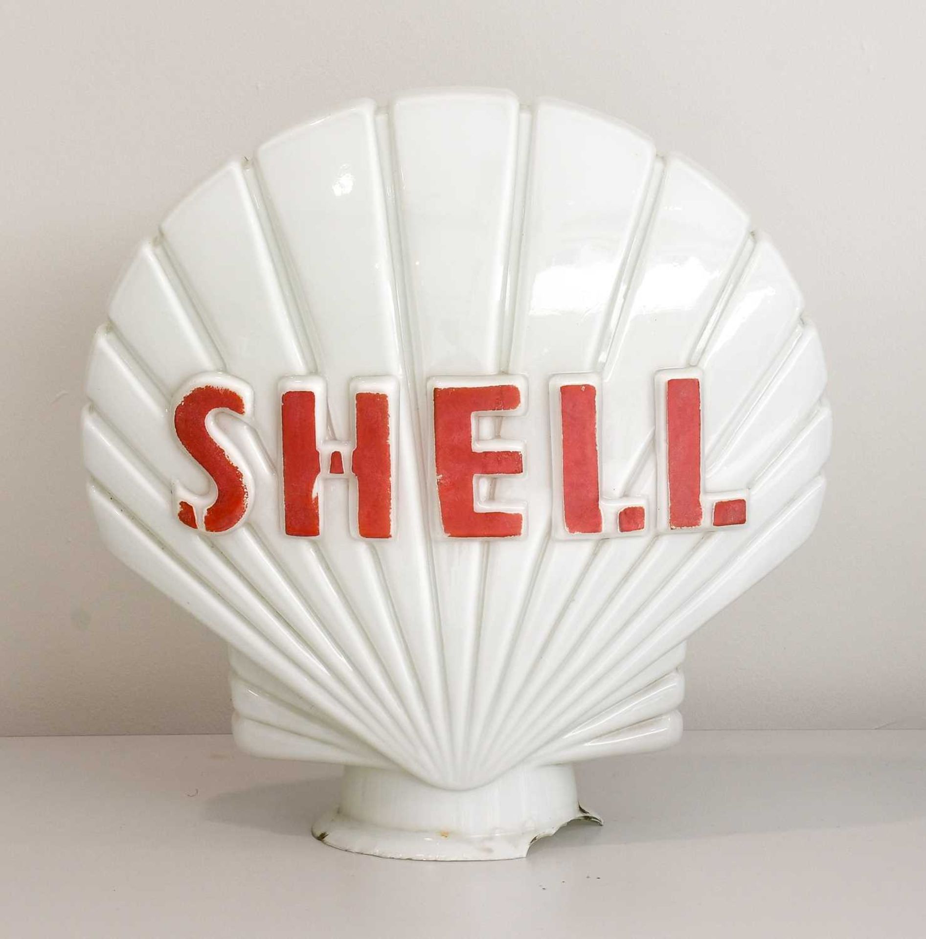 An Original Shell White Opaque Glass Petrol Pump Globe, with red lettering to both sides45cm high