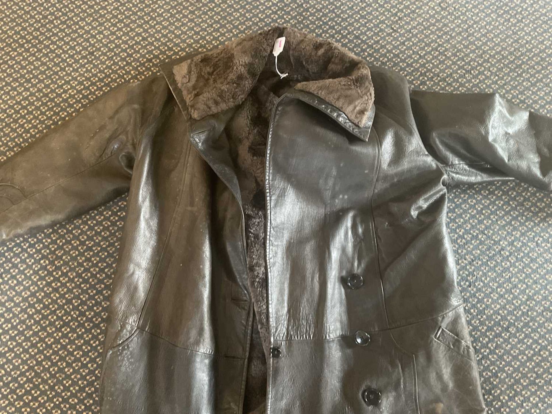 A Black and Brown Leather Driving Coat, Dunhills Ltd, 2 Conduit Street, London, with fur lining, - Bild 4 aus 11