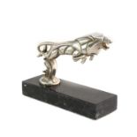 A Car Mascot signed Casimir Brau in the form of a leaping lion, in the Art Deco Cubist design and