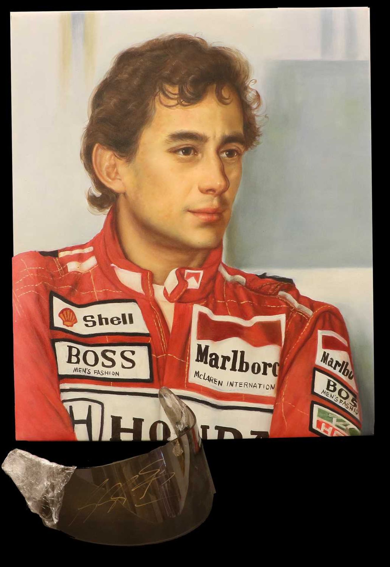 A Plastic Helmet Sun Visor, signed by Michael SchumacherA Portrait of Ayrton Senna, oil on canvas (