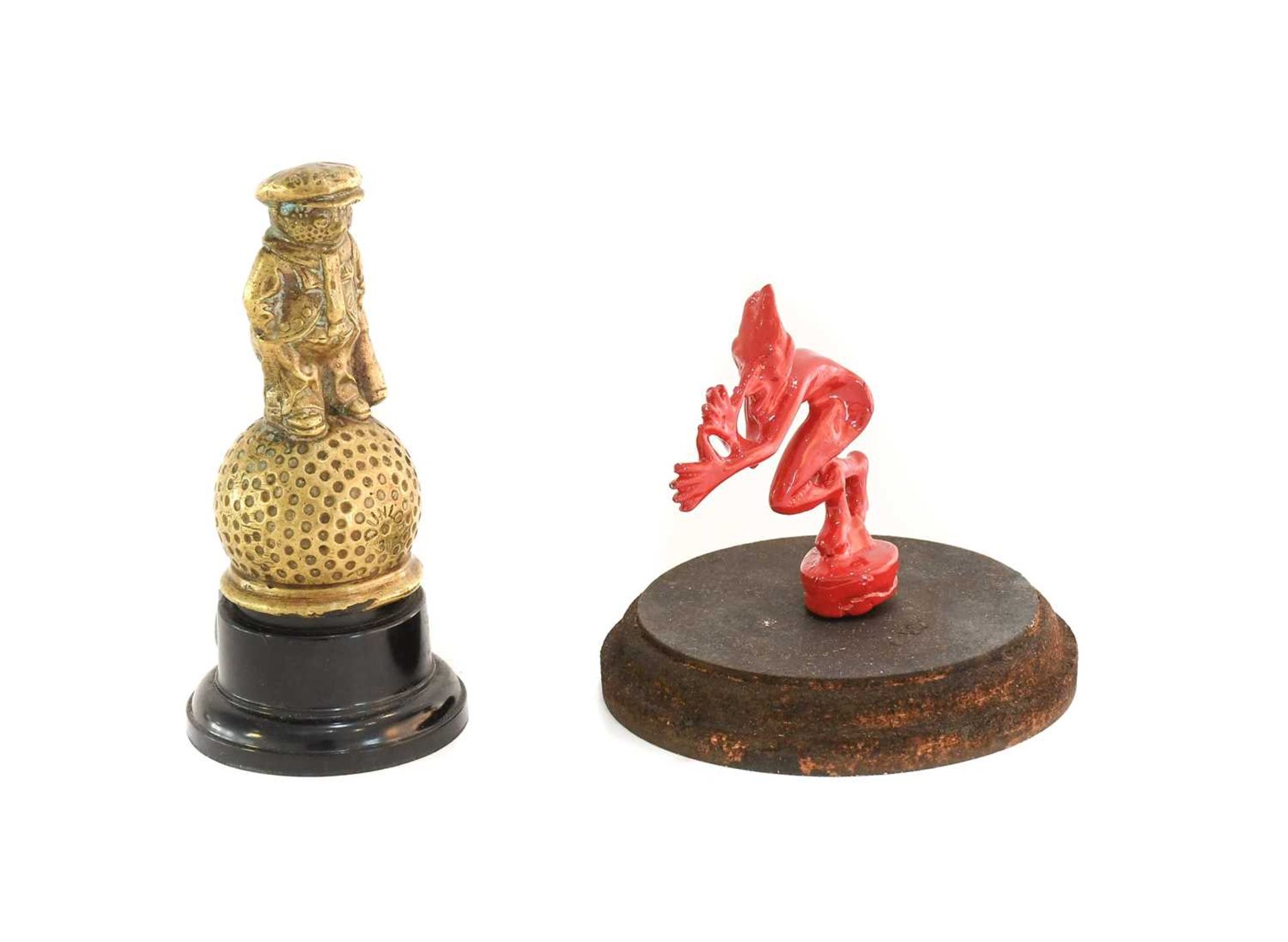 A Red Painted Car/Motorcycle Mascot, in the form of a cock-a-snoot figure8cm highA Brass Dunlop