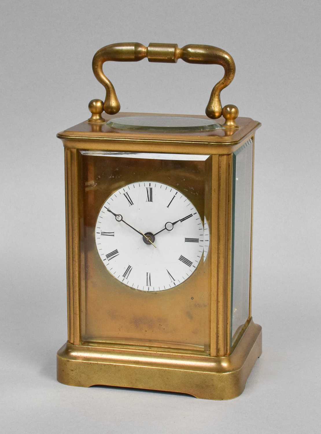 A Brass Carriage Timepiece, circa 1900, 15.5cm high over handle