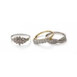 Three 9 Carat Gold Diamond Rings, of varying designsCrossover example - finger size S1/2. Floral