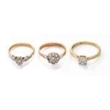 A 9 Carat Gold Cluster Ring, finger size O; A Diamond Solitaire Ring, stamped '18CT' and 'PLAT',