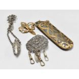 A Victorian Spectacle Case, chatelaine clip, and chatelaine with a perfume bottle