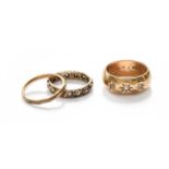 A 9 Carat Gold Diamond Three Stone Ring, finger size N; A 9 Carat Gold Band Ring, finger size M; and