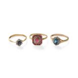 A Sapphire and Diamond Cluster Ring, stamped '18CT', finger size R1/2; A 9 Carat Gold Synthetic Ruby