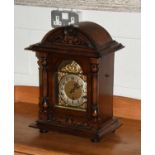 A German Westminster Chiming Mantel Clock, triple barrel movement chiming on gong rods, 46cm high