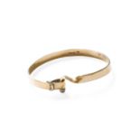 A 9 Carat Gold Bangle, inner measurements 5.5cm by 4.6cmGross weight 13.3 grams.