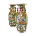 A Pair of Cantonese Porcelain Vases, mid 19th century, of baluster form, the trumpet necks applied