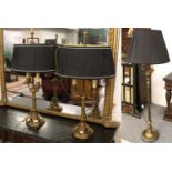 A Pair of Brass Effect Table Lamps and Shades, in the Regency taste, modelled as twin light