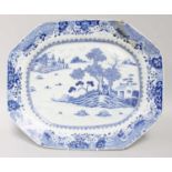 An 18th Century Chinese Blue and White Serving Plate, painted with fishing boats in a landscape,