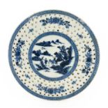A Chinese Porcelain Drainer, Qianlong, of circular form, painted in underglaze with a boy on a