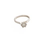 An 18 Carat White Gold Diamond Solitaire Ring, the round brilliant cut diamond in an illusion