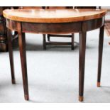 A George III Crossbanded Mahogany Demi-Lune Foldover Tea Table, 92cm by 46cm by 74cm