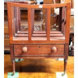A George III Mahogany Three Division Canterbury, moving on casters 36cm by 46cm by 61cm
