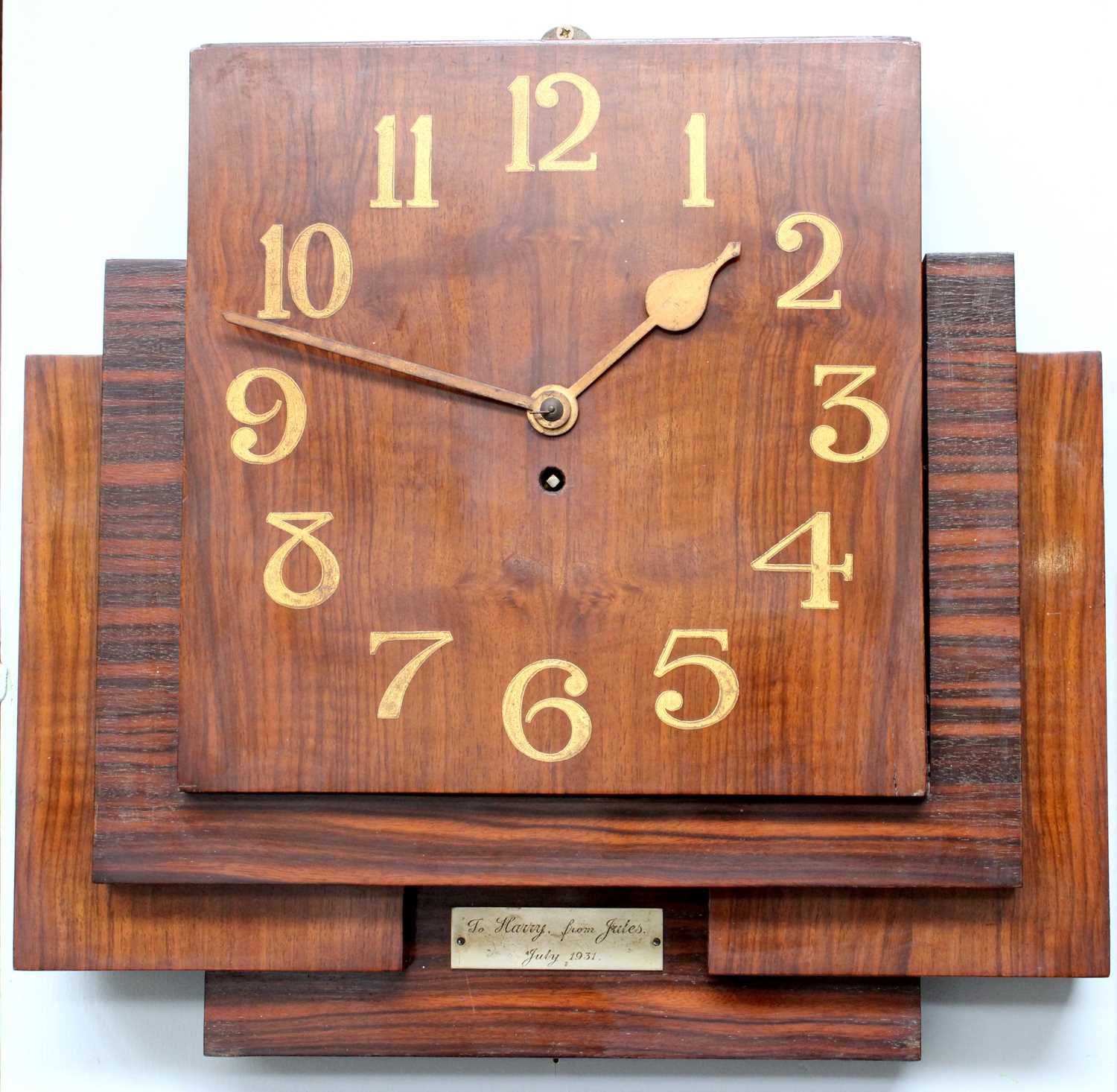 An Art Deco Rosewood Wall Timepiece, with gilt arabic numerals and presentation plaque, 45.5cm by