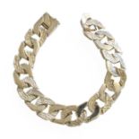 A Silver Curb Link Bracelet, length 20cm The bracelet is in good condition with slight scuffing