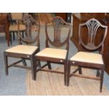 A Set of Eight Mahogany Chippendale Style Dining Chairs, with shield form backs