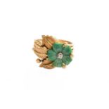 A Diamond and Green Hardstone Floral Ring, stamped '18K', finger size K1/2 Gross weight 6.0 grams.