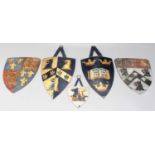 Five Toleware Heraldic Crests, 19th century, of shield form (5) One Pair - one 16cm wide by 19cm