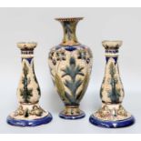 A Pair Of Fulham Pottery Stoneware Candlesticks by C.J.C. Bailey, with incised foliate decoration