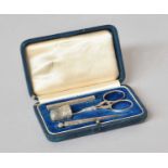 A Cased Silver Set