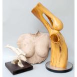 A Modern Life Cast of a Female Nude, a bone carving of a whale and calf (a/f) and a Modernist
