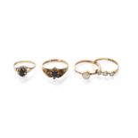 A Diamond Three Stone Ring, stamped '18C', finger size N1/2; Two 9 Carat Gold Cluster Rings,