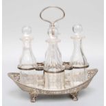 A Victorian Silver Four-Bottle Cruet-Stand, by Joseph Heming, London, 1900, Retailed by Heming and