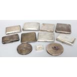 A Collection of Assorted Silver Cigarette-Boxes and Compacts, variously shaped, some engine-