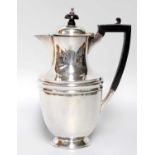 A George V Silver Hot-Water Jug, by James Henry and Herbert Barraclough, Sheffield, 1910, tapering