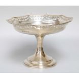 A George V Silver Pedestal Dish, Birmingham, 1931, the shaped circular bowl with pierced and