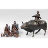 A Set of Eight South East Asian Bronze Opium Weights, formed as elephants and on canted plinths,