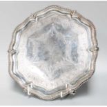 A Victorian Silver Salver, by John Aldwinckle and Thomas Slater, London, 1880, shaped circular and