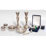 A Collection of Assorted Silver, including a pair of candlesticks, bases stamped '925'; a pair of