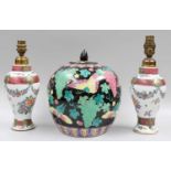 A Pair of Samson Porcelain Tablelamps, decorated in Chinese famille rose style with flower swags,