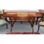 A Reproduction Mahogany Drop-Leaf Sofa Table, with reversible games top, 151cm by 56cm by 75cm