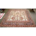 Amritsar Carpet, the ivory field of flower heads and vines enclosed by charcoal borders, 264cm by