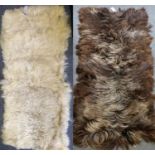 An Icelandic Bronze Sheepskin Rug & Another White Example, 160cm by 90cm, and 167cm by 80cm, (2)