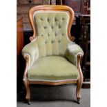 A Green Upholstered Two Seater Sofa